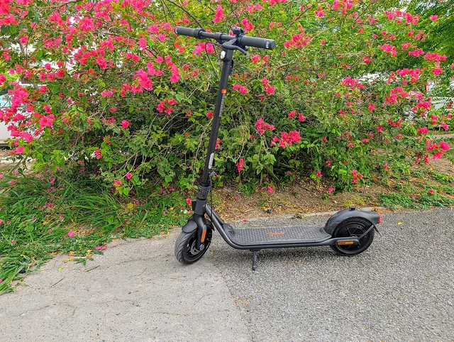 A Ninebot Kickscooter parked on a street